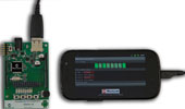 Figure 6. Microchip’s PIC24F Accessory Development Starter Kit for Android interfacing to a Nexus S phone, using the Open Accessory Framework.